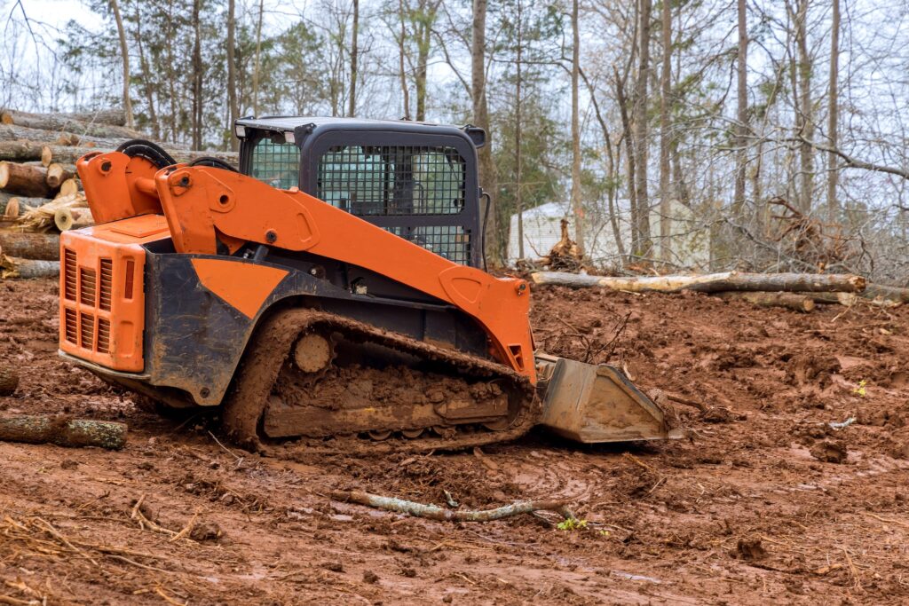 Tractor work with during landscaping works align the land for construction site
